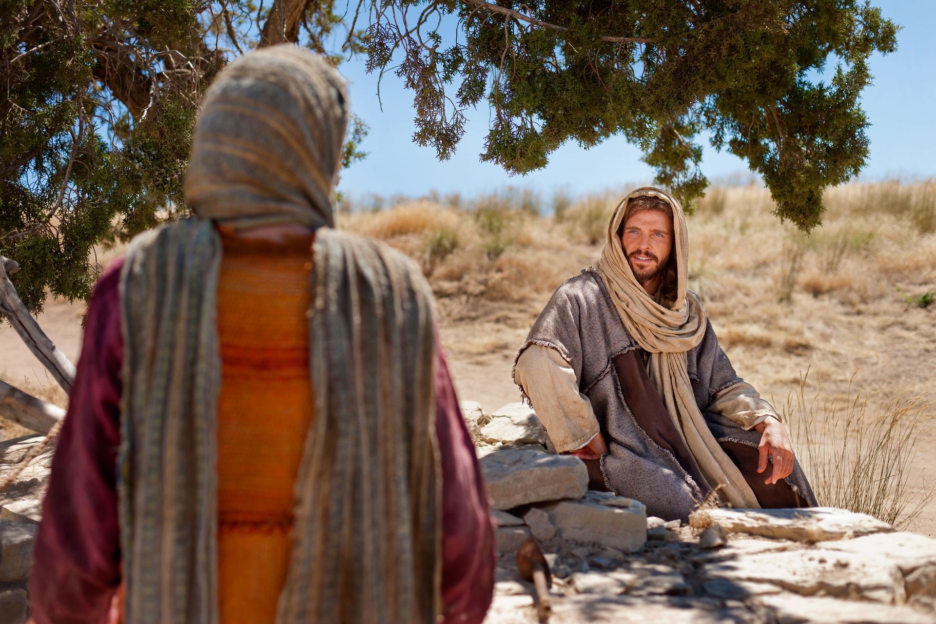Jesus asks a Samaritan woman to give Him drink.