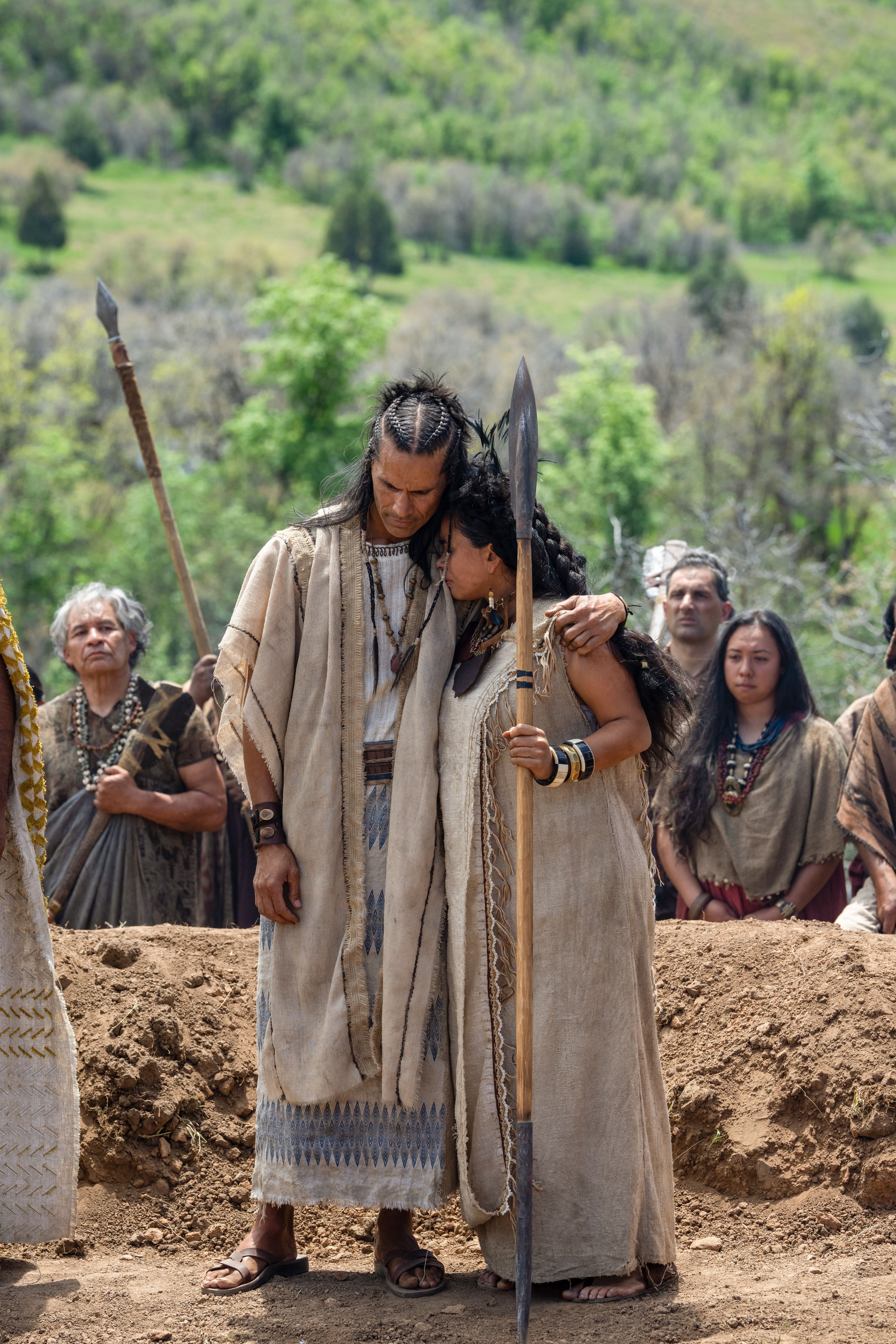 Anti-Nephi-Lehi hugs his wife before burying their weapons of war.