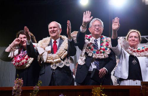 President Nelson and others waving