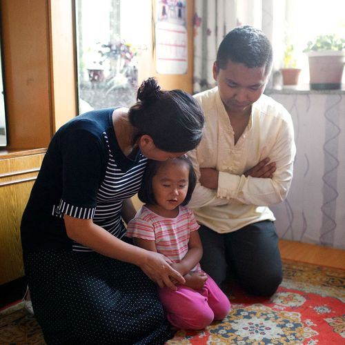 family praying