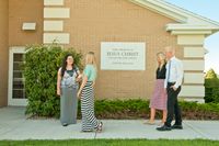 youth outside chapel