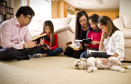 Family studying scriptures