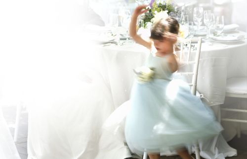 little girl dancing in a dress