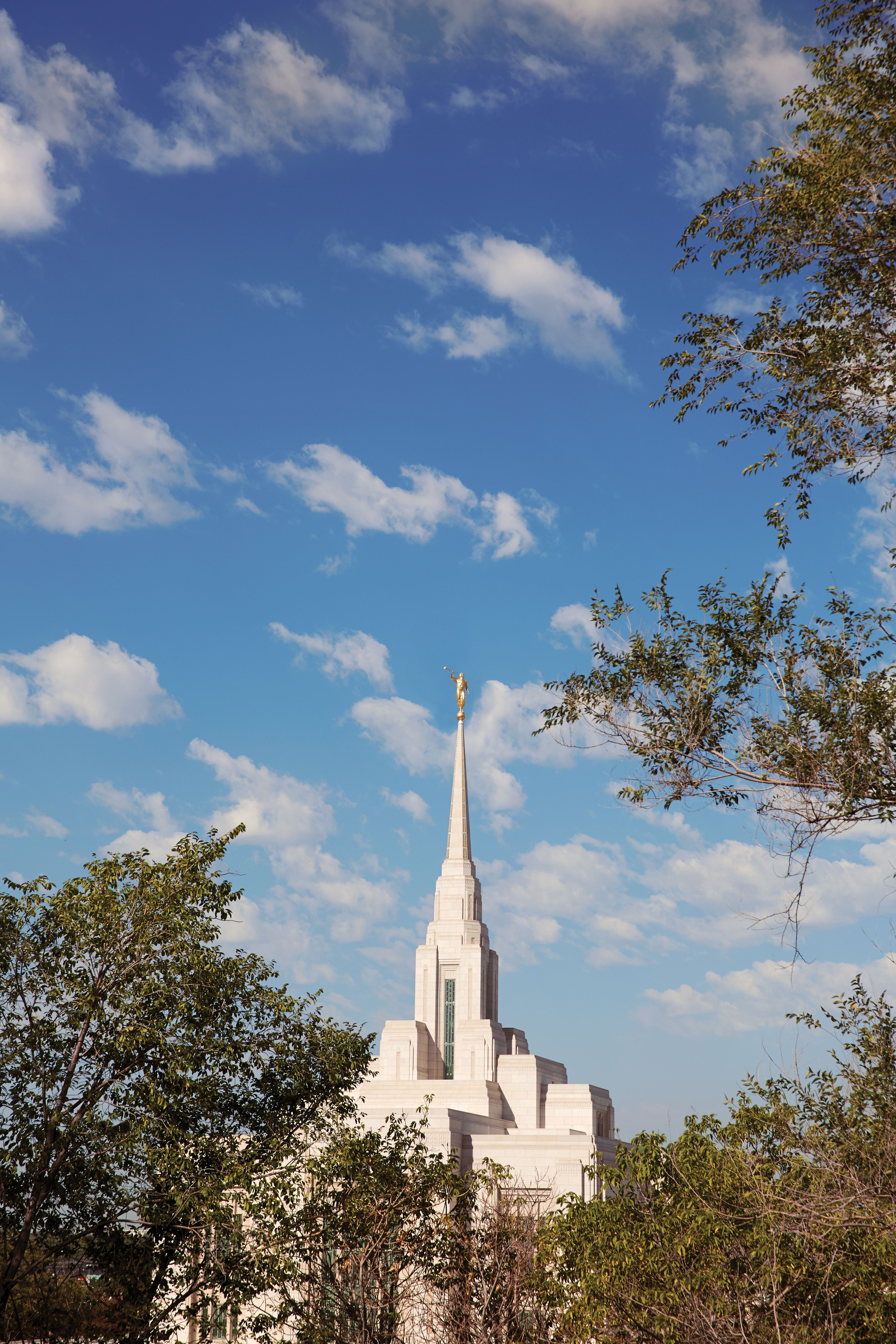 The Ogden Utah Temple spire, including the exterior of the temple and scenery.