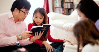 parents study the scriptures with their children