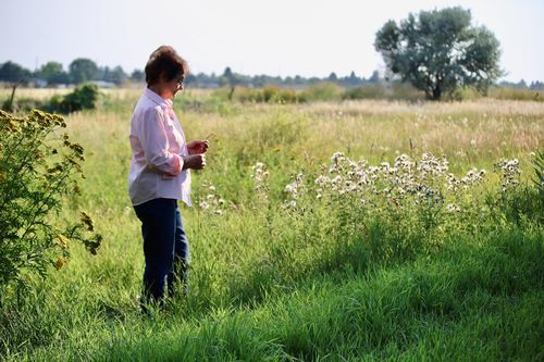 woman standing in a field