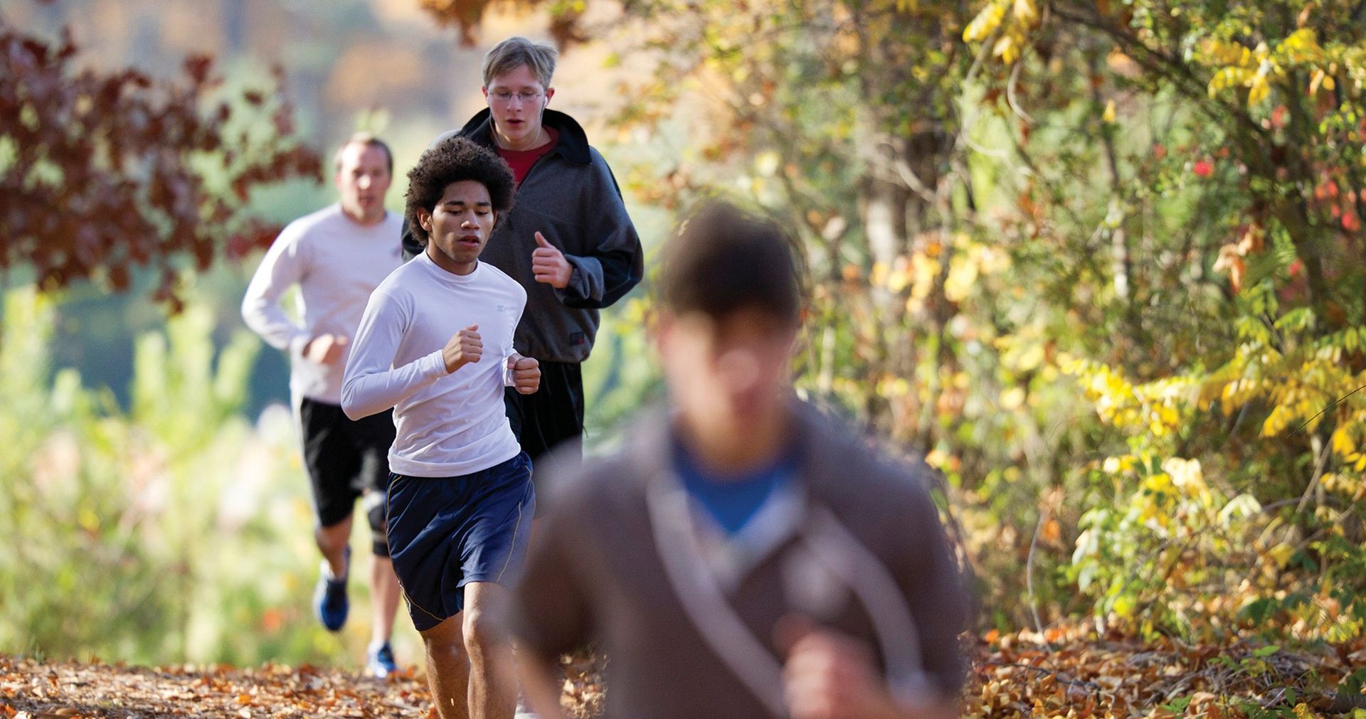 Young men running.