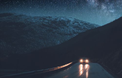 car on a road at night