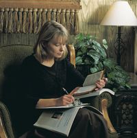 woman studying scriptures and general conference talks