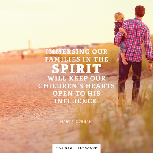 An image of a father and child combined with a quote by Sister Durham: “Immersing our families in the Spirit will keep our children’s hearts open to His influence.”