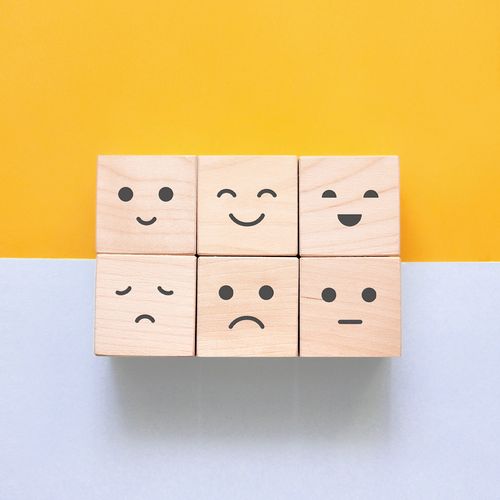 blocks with faces drawn on them
