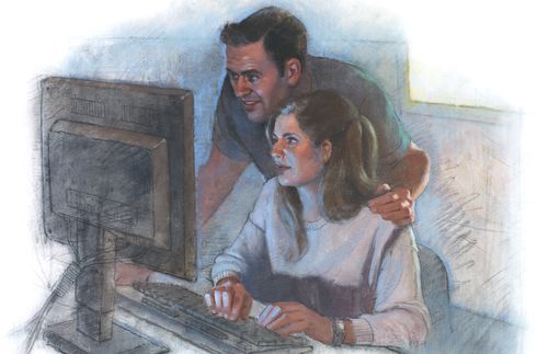 couple looking at computer screen