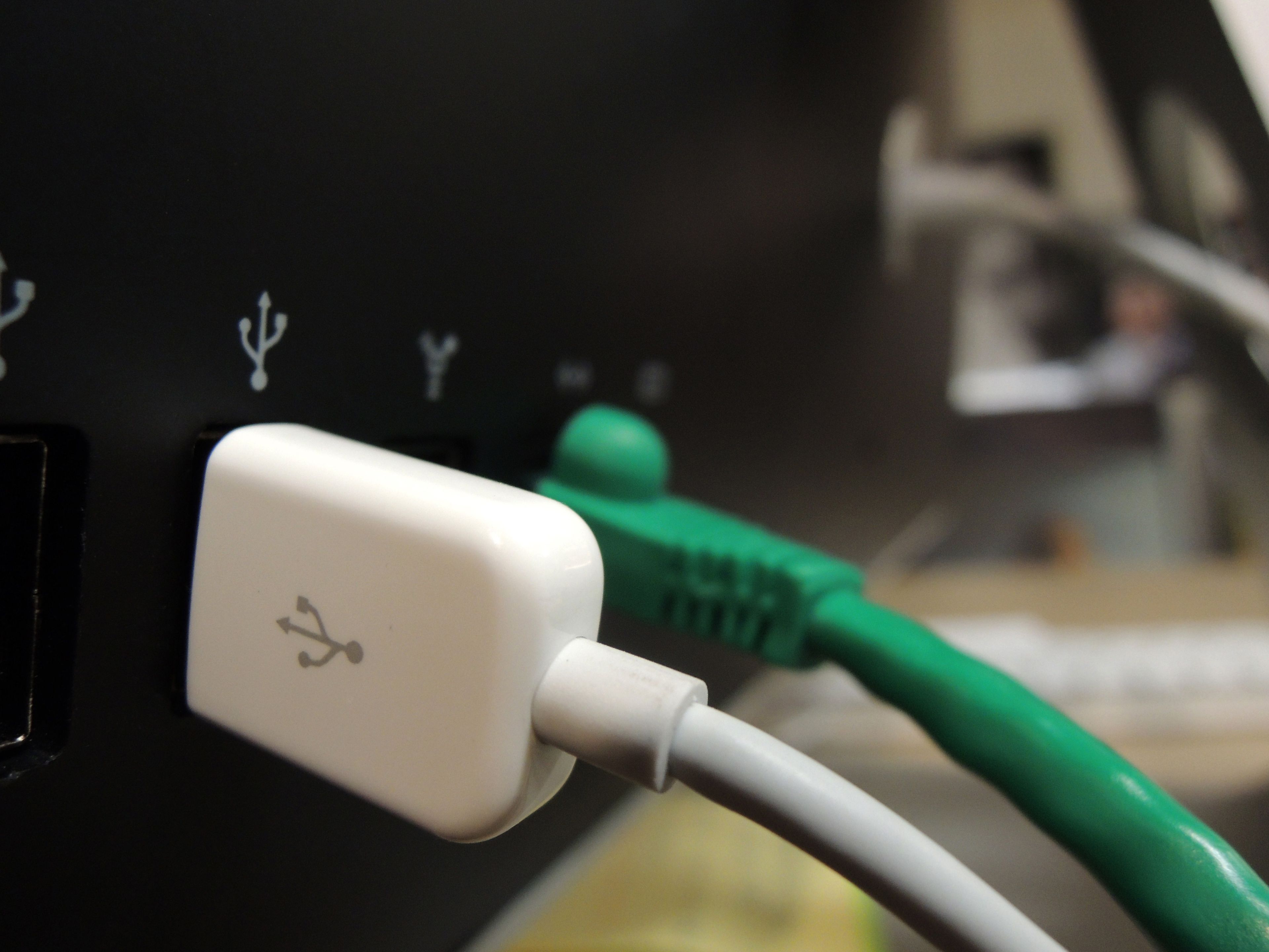 An image of a cord plugged into a USB port.