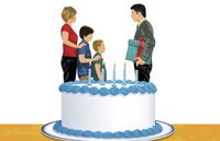 people standing behind cake