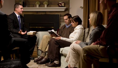 missionaries teaching family