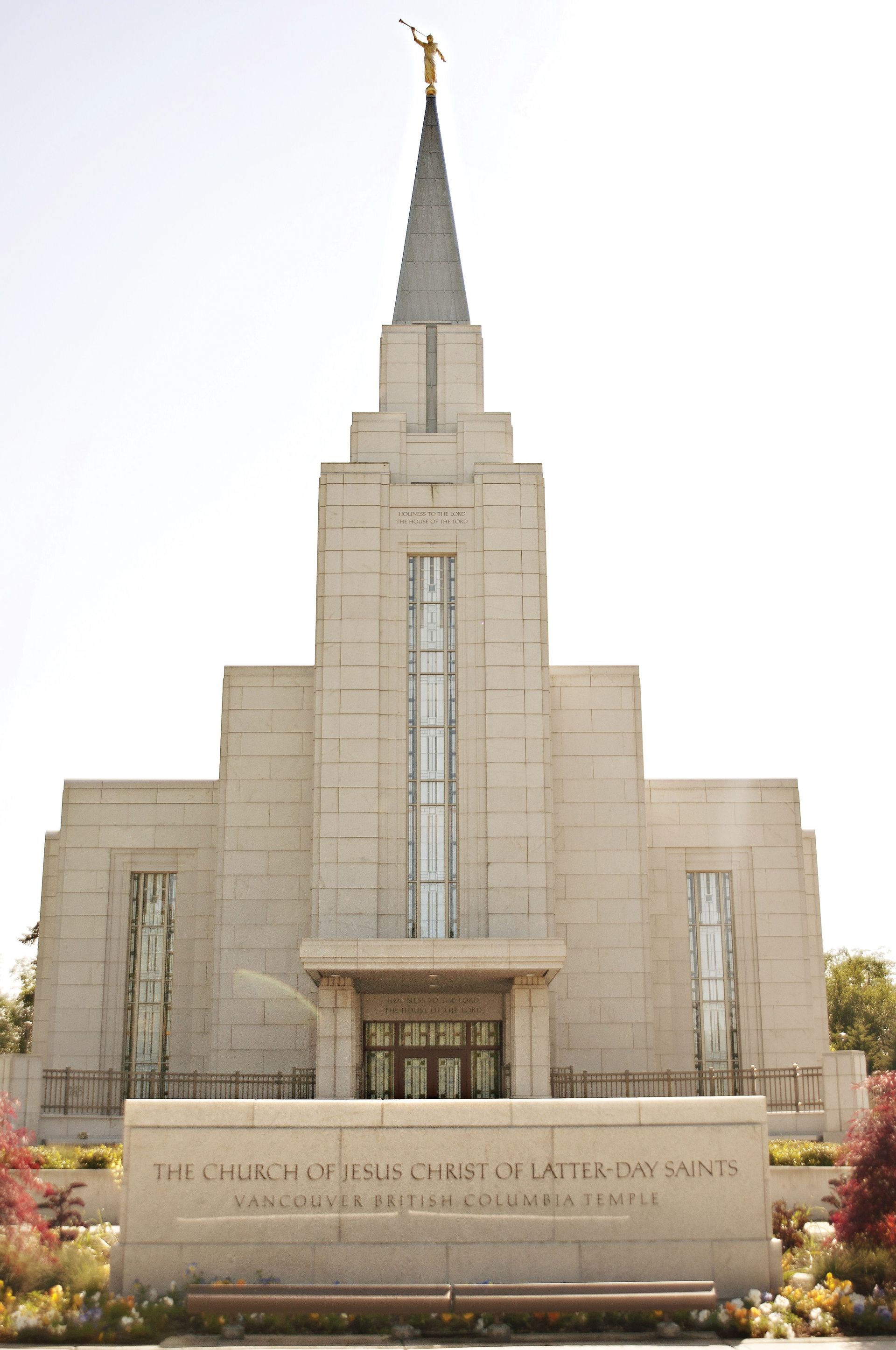 The entire Vancouver British Columbia Temple, with the name sign, entrance, windows, and spire.
