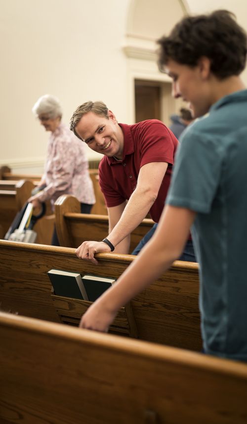 people cleaning church