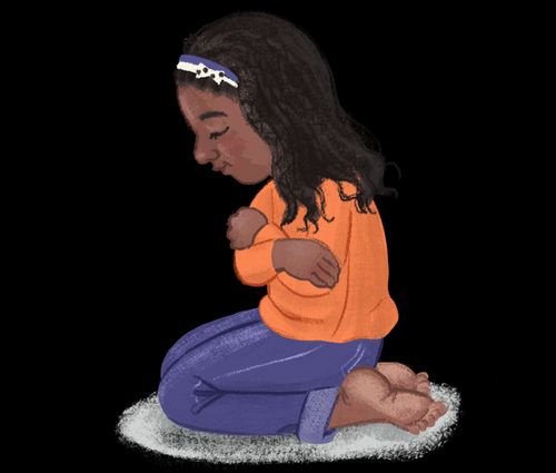 A girl praying on her knees 