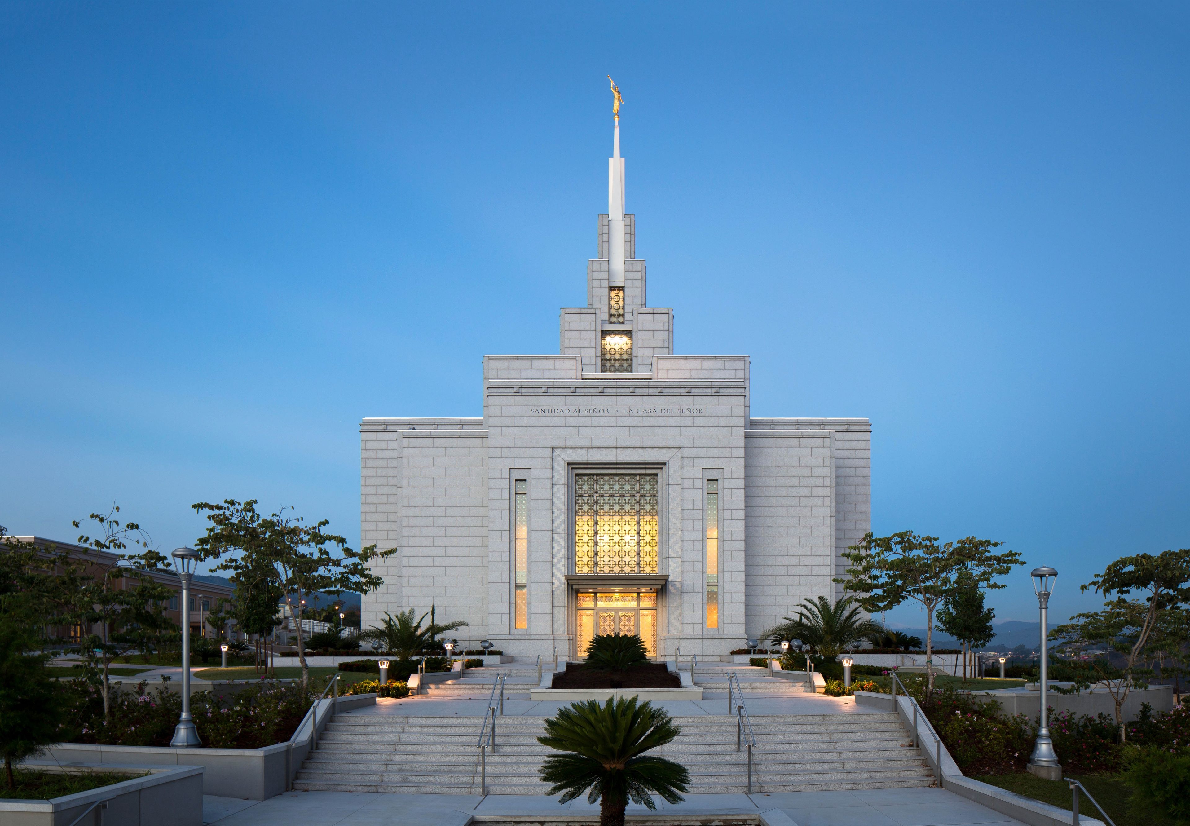 The Tegucigalpa Honduras Temple in the evening, including the entrance and scenery.  
