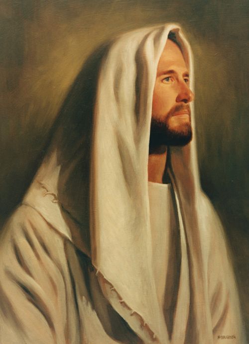 A portrait of Christ in white robes with a white head covering, looking over to the right side.