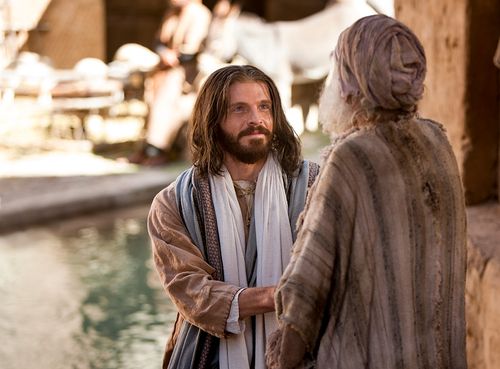 Cristo segurando a mão de um homem