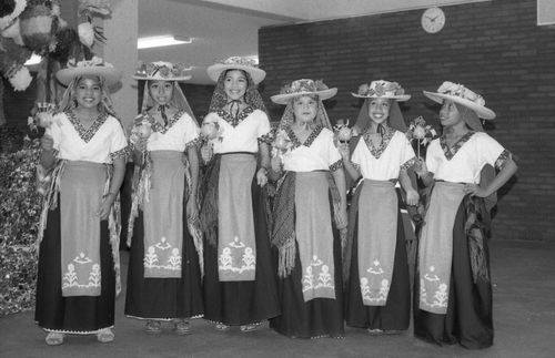 group of young women in traditional costumes