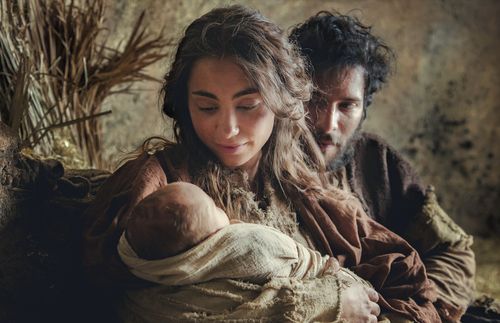 scene from film with Mary, Joseph, and baby Jesus