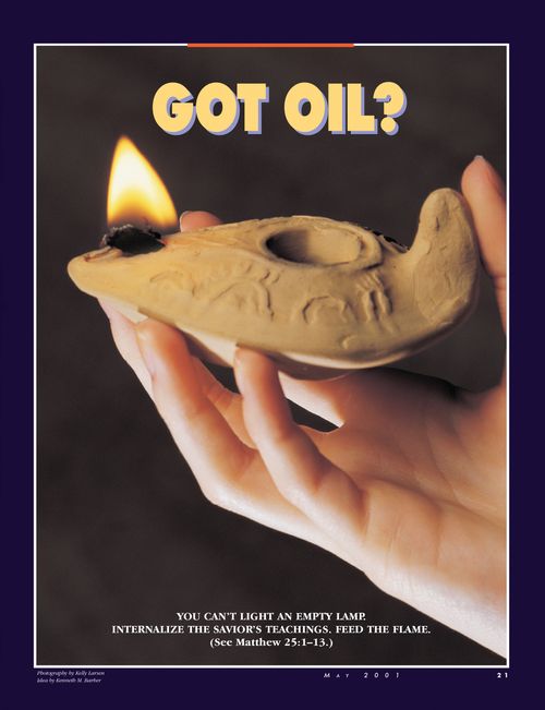 A hand holding an old oil lamp, paired with the words, “Got Oil?”