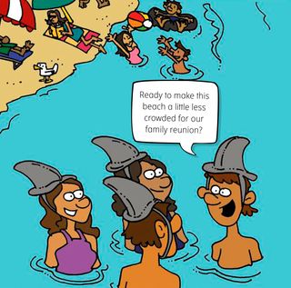 A few youth (family and extended family members) wear shark hats and prepare to swim in the ocean and scare people away.