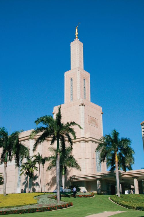 A front and side view of the Santo Domingo Dominican Republic Temple, including a partial view of the entrance.