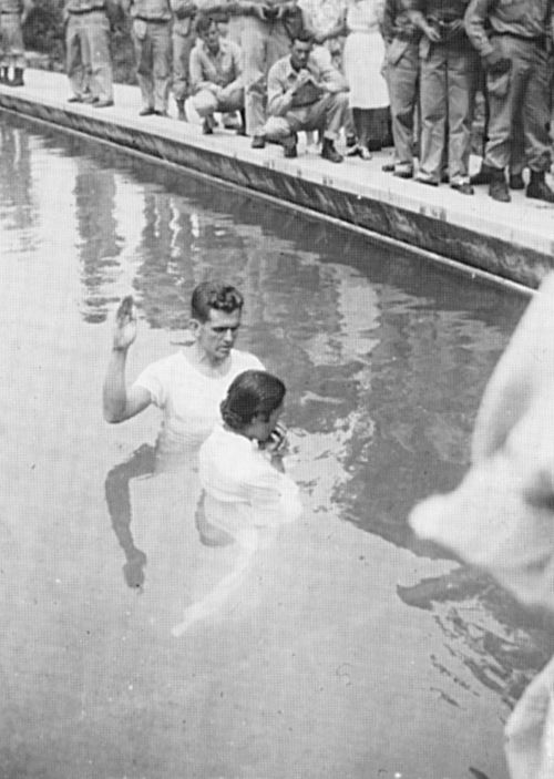 Boyd K. Packer baptizing a Japanese woman