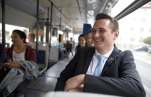 missionary smiling on the bus