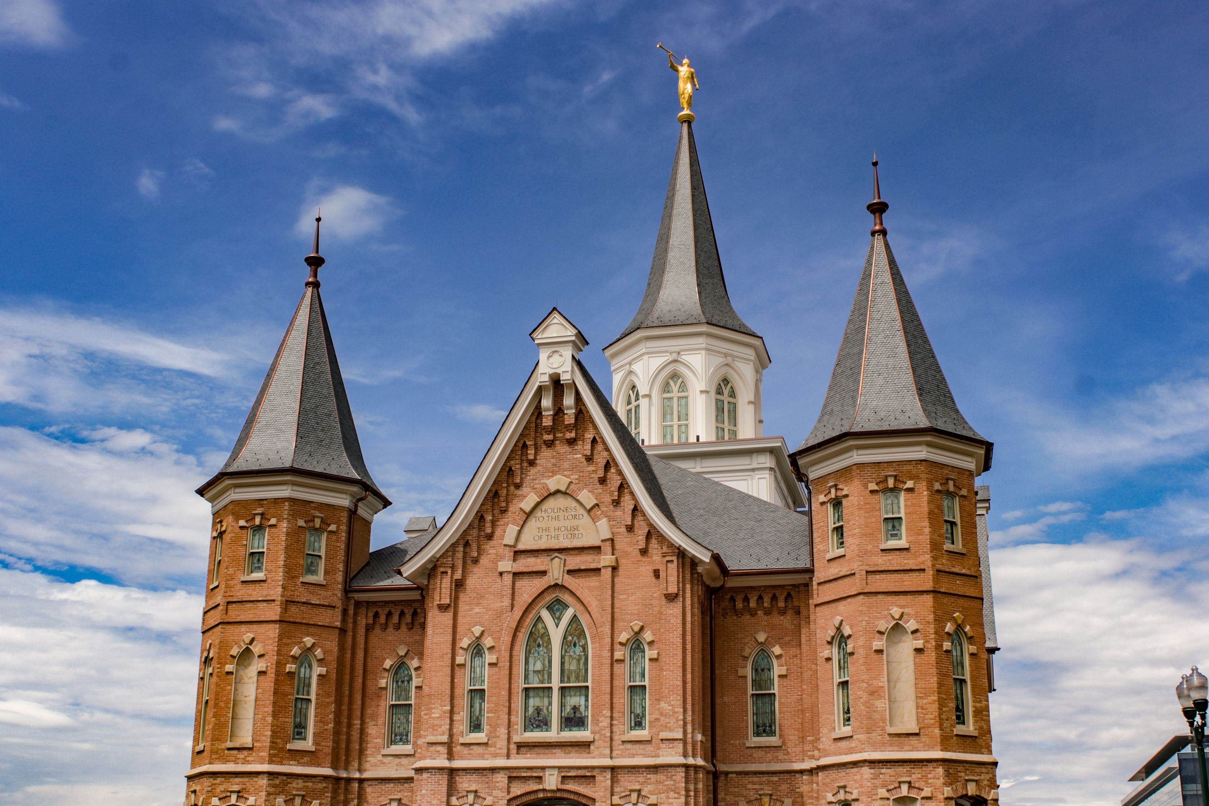 A front view of the Provo City Center Temple during the day.
