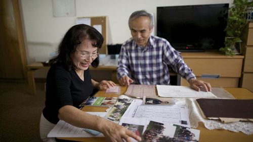 family filling out their family history