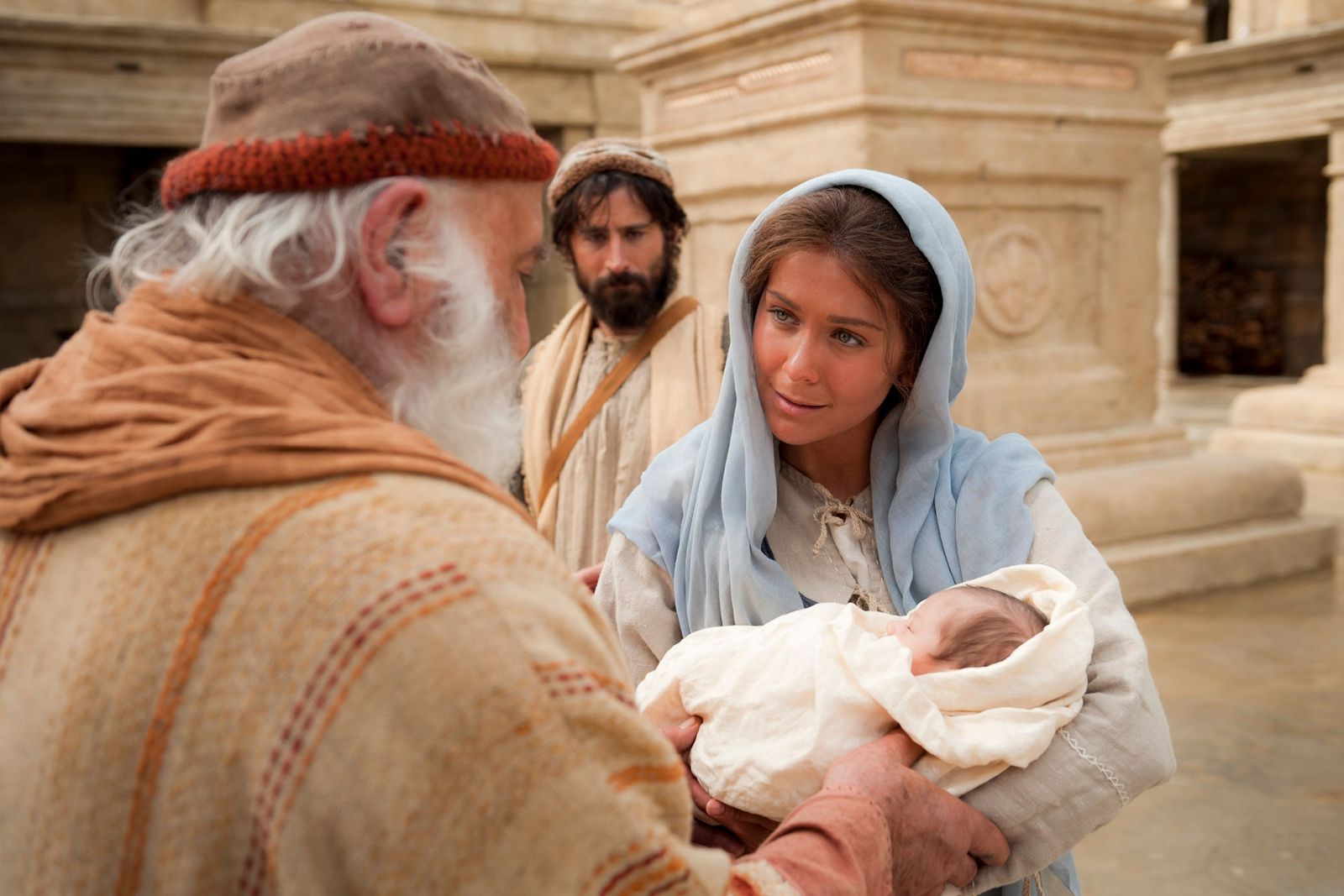 Mary and Joseph present Jesus at the temple.