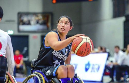 Julieta playing basketball