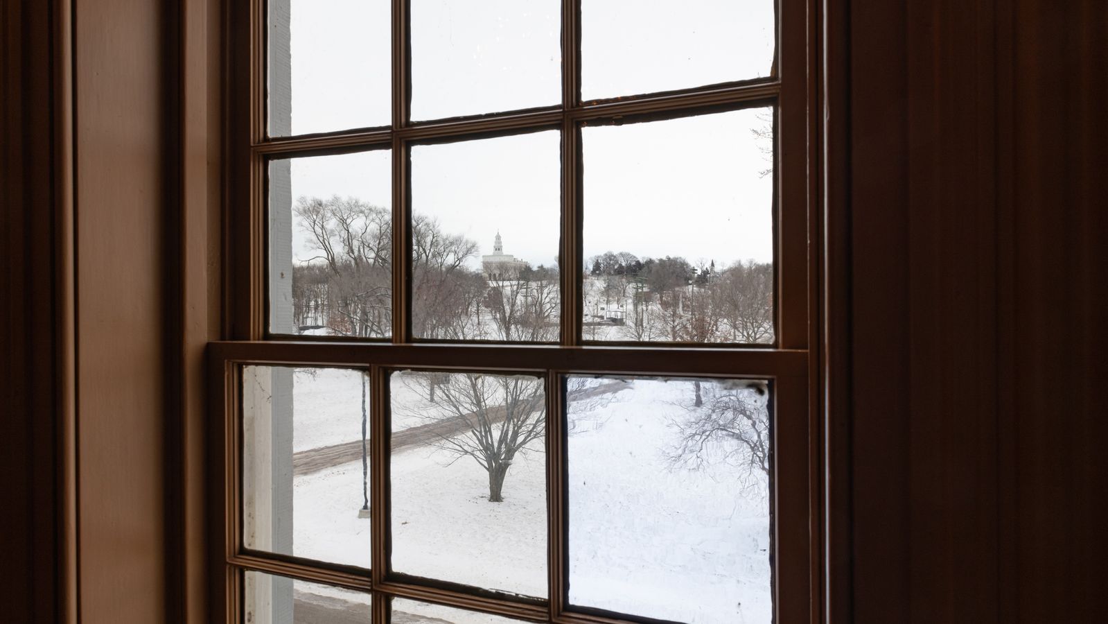 Cultural Hall’s third-story window, individuals could see the Nauvoo Temple being built.  