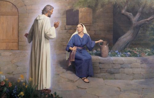 A painting by John Scott showing Mary in a blue robe, sitting on a rock wall and looking up at the angel Gabriel, who stands near her.