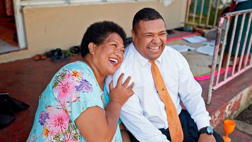 couple laughing together