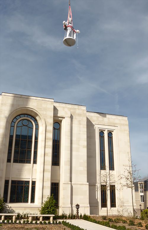 Statue being placed at Paris France Temple