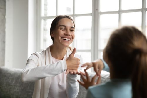 woman using sign language