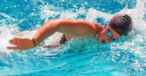 young woman swimming