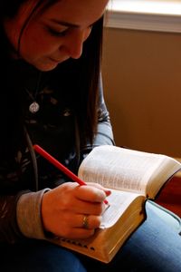 teenager marking scriptures