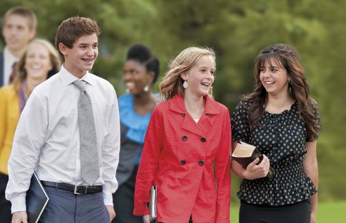 Youth walking on Temple Square.