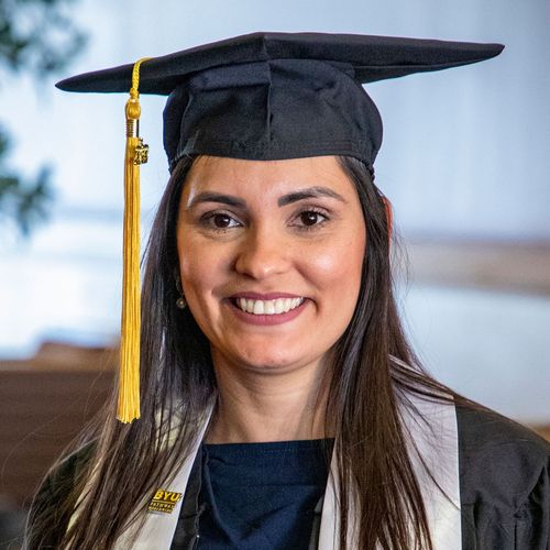 young adult woman wearing graduation cap