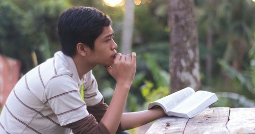 young man studying