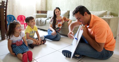 father teaching children