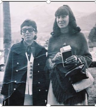 two women standing outside