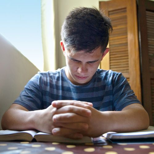 young man praying