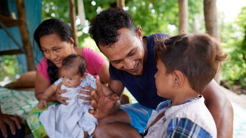 father teaching family